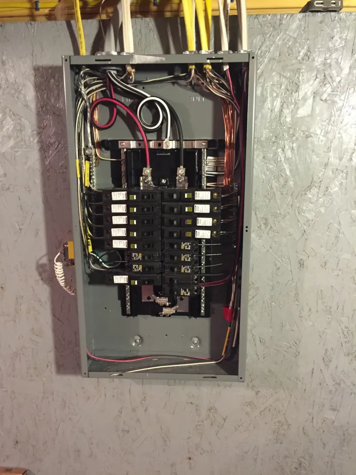 Open breaker panel with organized wiring